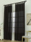 Závěsy s poutky 140 × 160 cm – Oscar černé (2 ks)